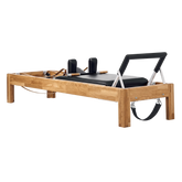 Pilates Reformer in solid oak wood - pilates studio and home studio equipment by Consta Pilates Equipment.