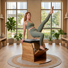 Pilates Wunda Chair in solid oak wood - pilates studio and home studio equipment by Consta Pilates Equipment.