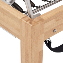 Pilates Reformer in solid beech wood - pilates studio and home studio equipment by Consta Pilates Equipment.