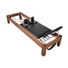 Solid Walnut Reformer, premium boutique pilates studio equipment by Consta Pilates Equipment.